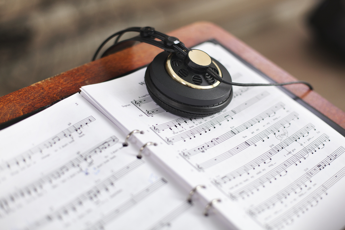 headphones on music sheet notation